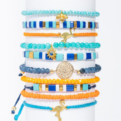 Lumisha: Armband Anon handgeknüpft blau-orange 4mm türkis Anhänger Stern gold