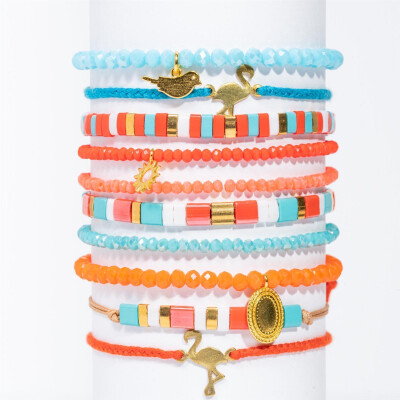 Lumisha: Armband Anon handgeknüpft rot-türkis 4mm orange Anhänger Medallion gold