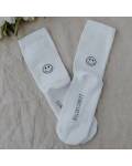 Eulenschnitt: Stylische Socken in weiß aus...