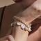 The Moshi: Armband elastisch 2reihig Lovis creme