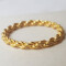Muja Juma: Ring gold braided band 56