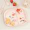 Kinderteller mit Unterteilungen aus PP in rosa Motiv Foodies von Done by Deer