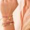 A beautiful Story: dreireihiges elastisches Armband mit Karneol und Glasperlen